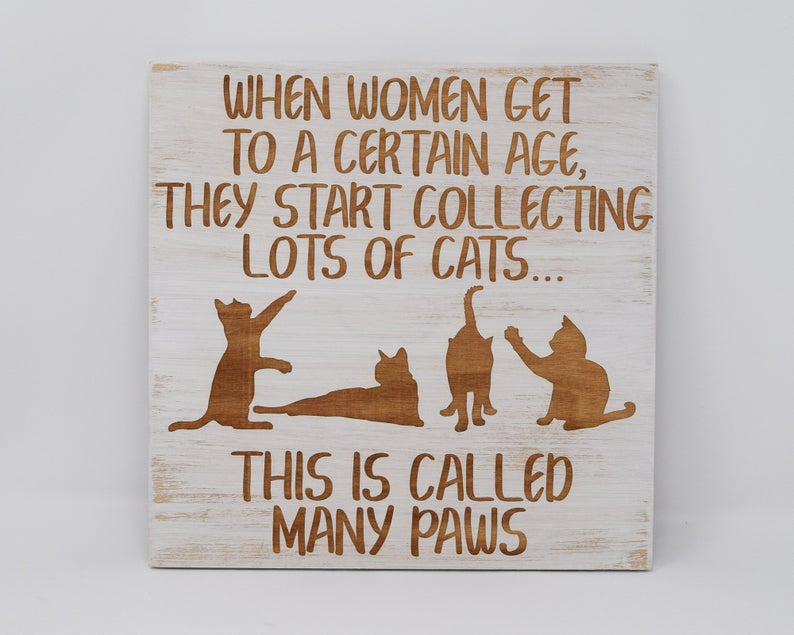 When women get to a certain age, they start collecting lots of cats... This is called many paws - Shore Thing Laser